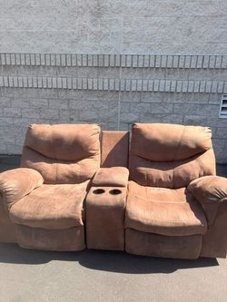 Brown love seat recliner