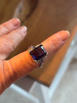 Emerald cut amythyst with baguettes in sterling sz 9