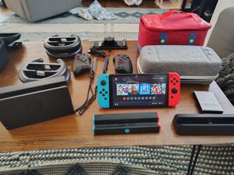 Nintendo Switch OLED Lot – Complete Setup + Extra Docks, Controllers & Cases (Excellent Condition)