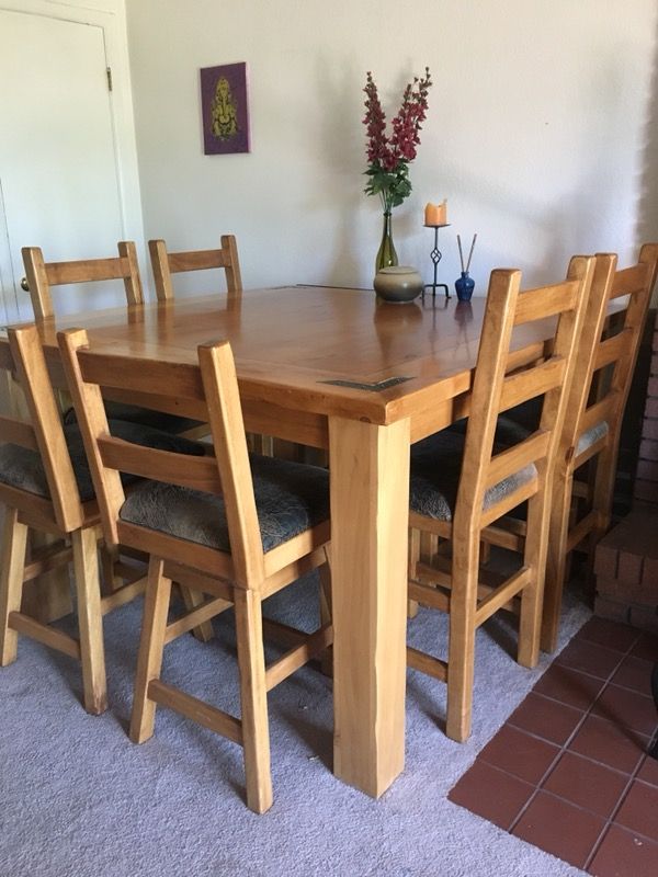 Classy tall and large dining table with 6 chairs
