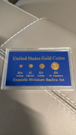 Miniature gold replica coin