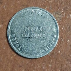 One vintage Pueblo parking token
