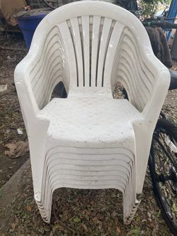 White patio chairs, 12