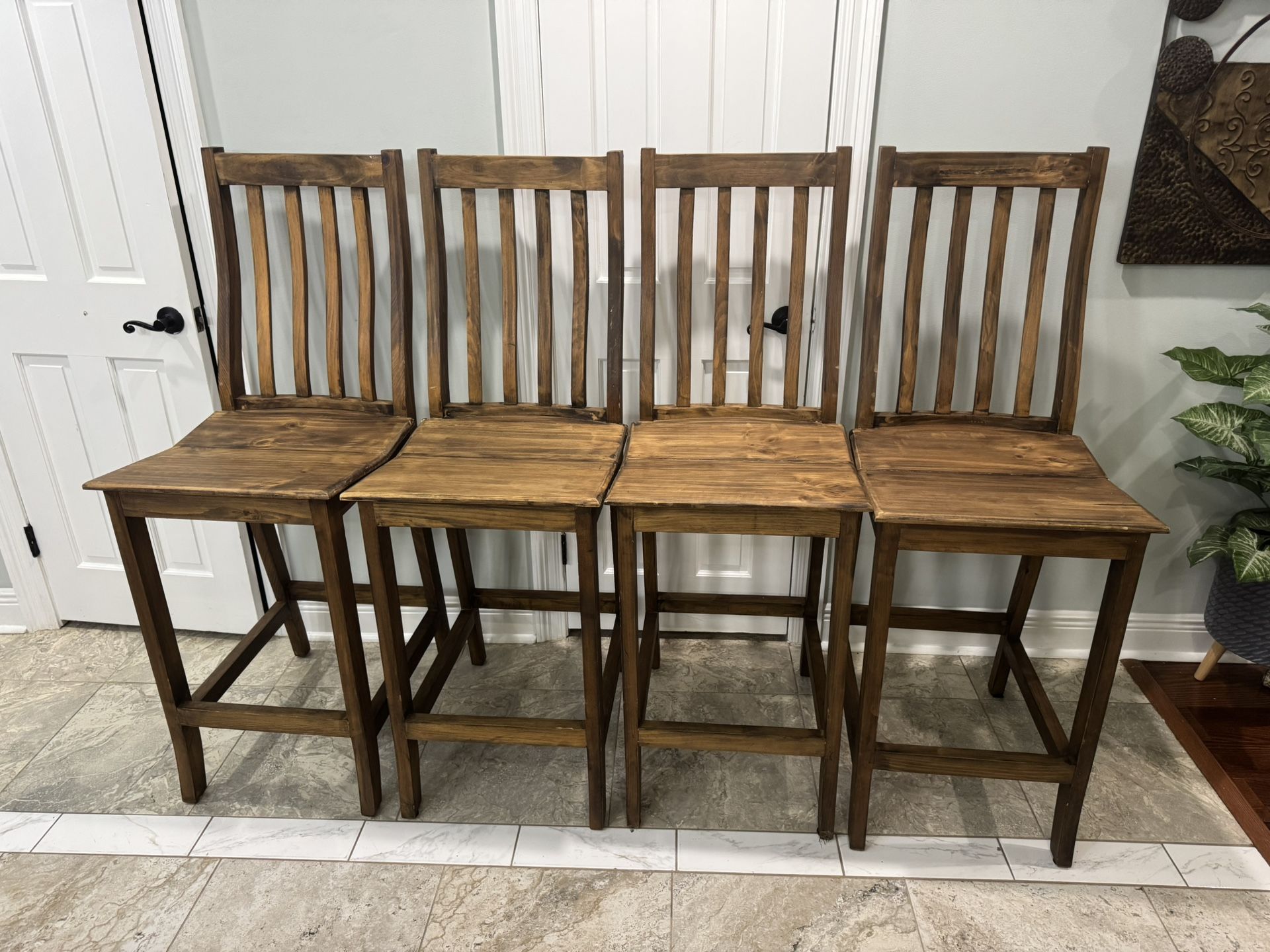 4 sturdy wood tall chairs/ excellent condition measured below