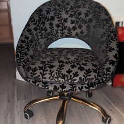 Flowery Black & Gold Rolling Chair $60