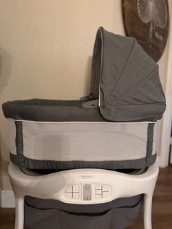 Bassinet + brand new sheets (unused)