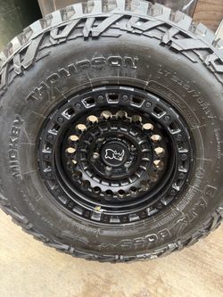 5 Mickey Thompson Baja Boss MT LT315/70R17 Tire on Black Rhino Wheel
