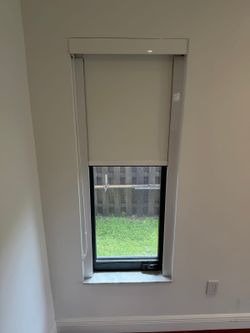 Modern Black Frame Windows with Custom Roller Shades â€“ 9 available