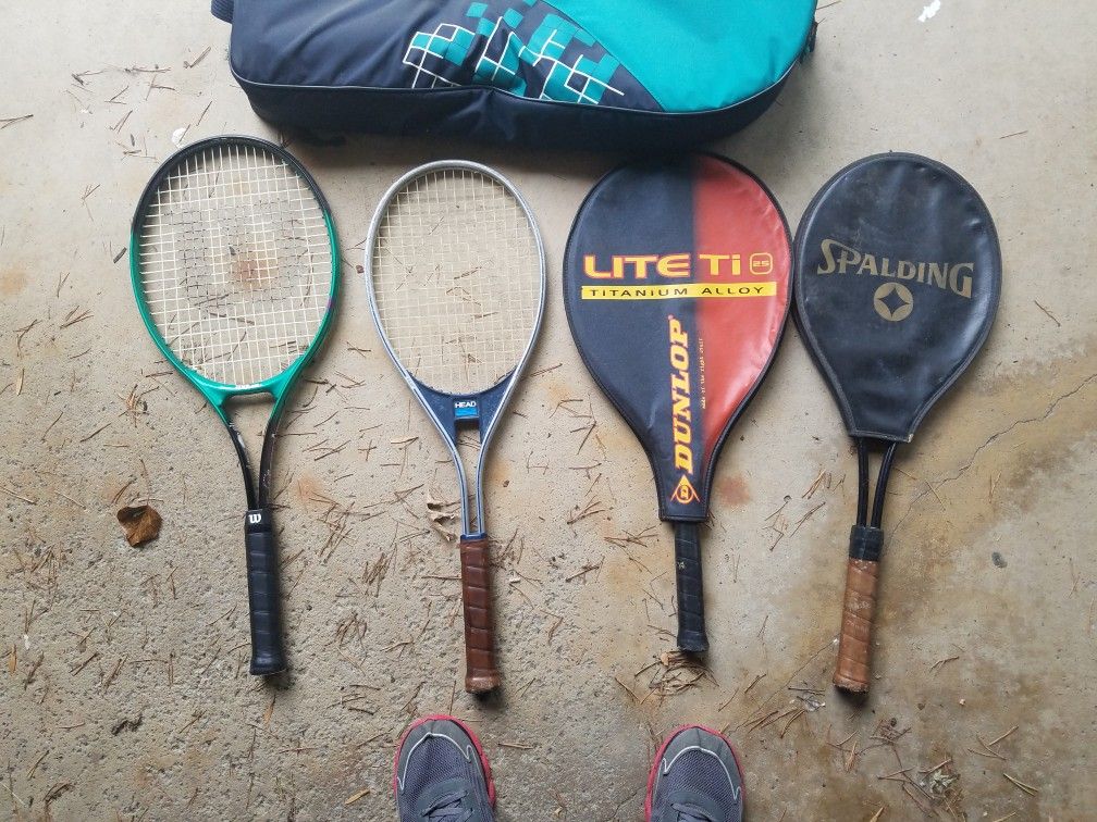 4 tennis rackets with case and balls