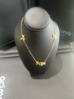 15.5 inch 14k link bracelet with flower / clover pieces
