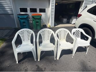 Stackable white Plastic chairs