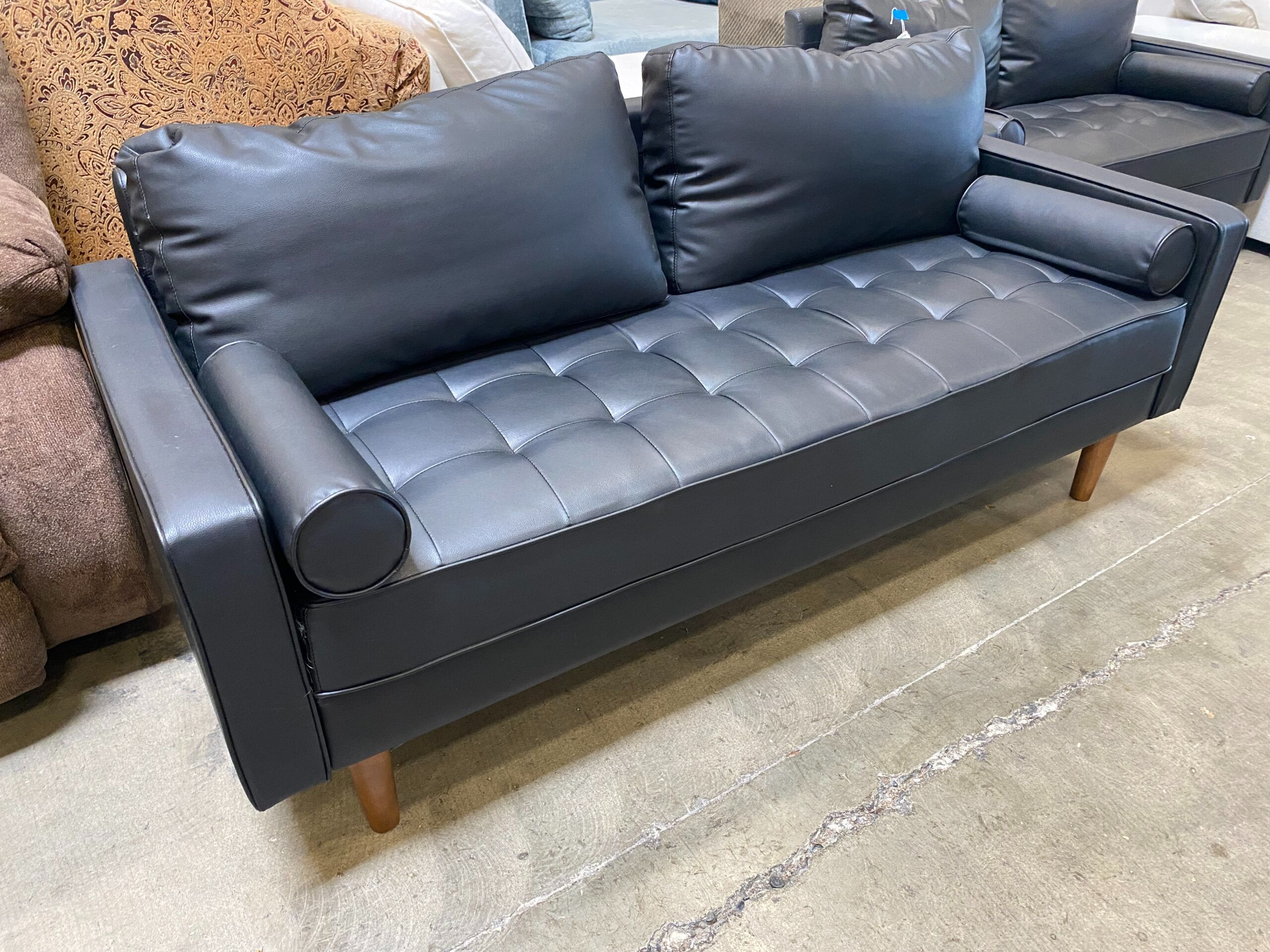 IKEA Black Sleek Tufted Sofa