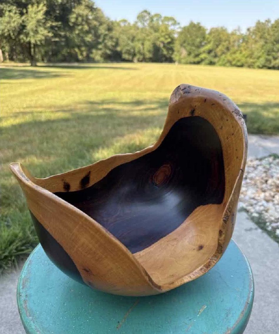 This is a contemporary wooden bowl by Arturo Solano.
