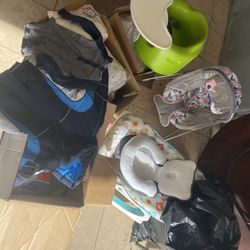 Baby Clothes And Bouncers And Chair