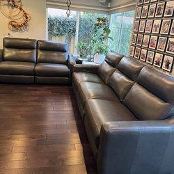 Dark Grey Leather Sofa set with four power recliners ($1,800)