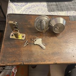 LOT of 3 Items- Used Good Condition 1-Schlage Door Knob, Privacy Lock, 1- Deadbolt with 2 Keys, 1-Exterior/Interior Passage, Reversible Lever Non-Lock