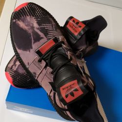 Brand new black with red sole addidas prophere