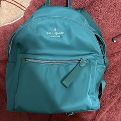Green Kate Spade backpack, the Watson Lane Hartley