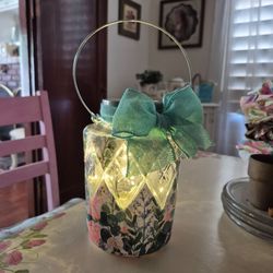 Indoor or outside lantern holds votive candle