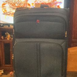 Large, heavy duty, blue durable suitcase