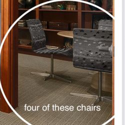 (4) Fabric Covered Swivel Armless Dining-type Chairs