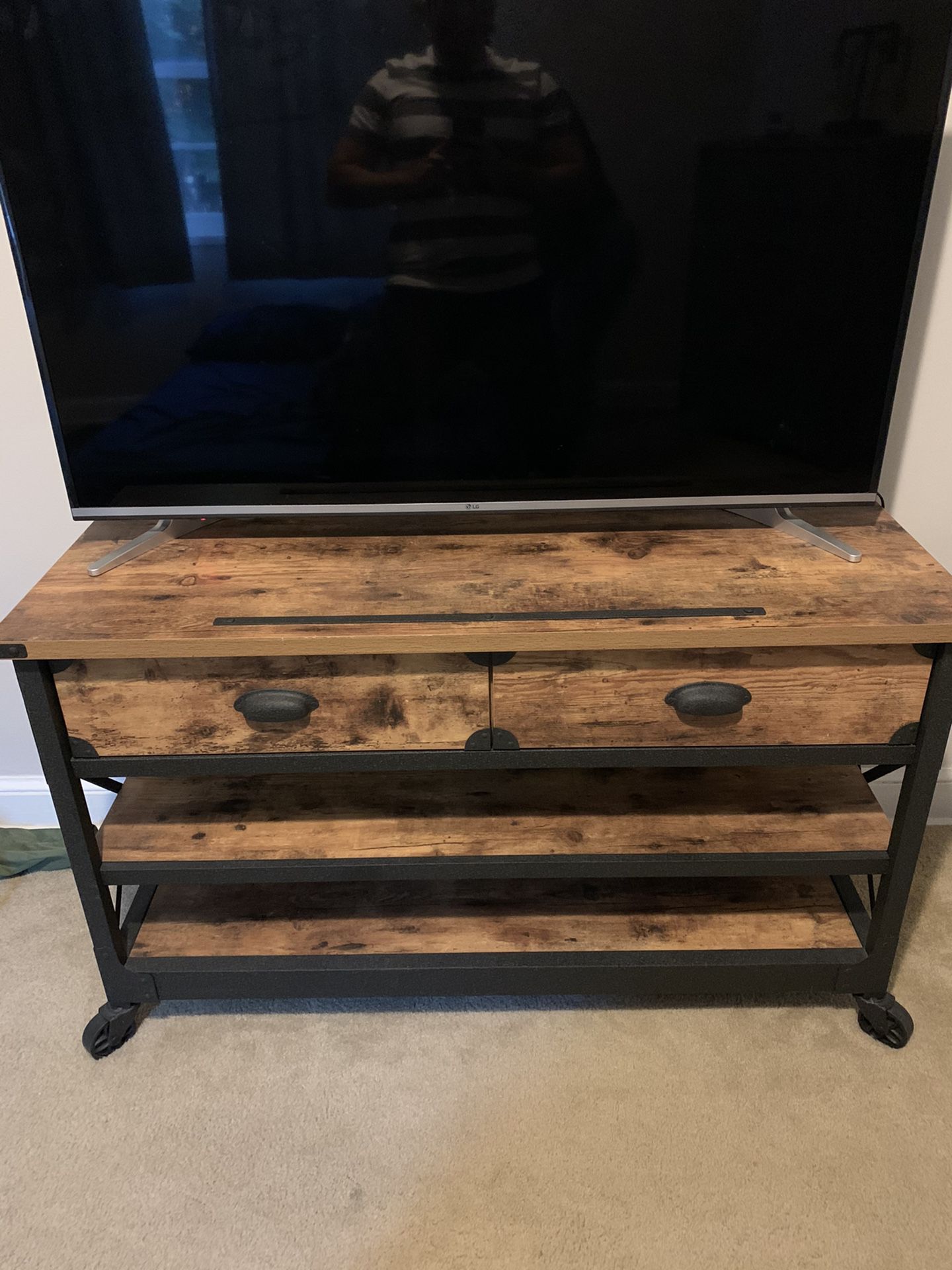 TV stand with minor scrape (second picture).