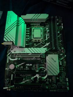 Asus prime Z790-P wifi with Intel i9 13900 k inside, 32 gigs of Kingston fury ram (2x16) and a MSI cooler to pair with cpu
