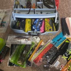 Fishing Tackle Box With Loads Of Lures And Worms 