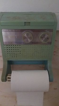 Vintage toilet holder with radio from 1930s