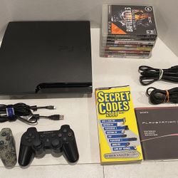 Sony PlayStation 3 Slim Console With 2 OEM Controllers And 8 Games