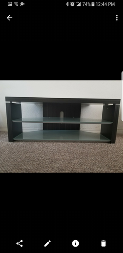Tv stand with tempered glass shelves