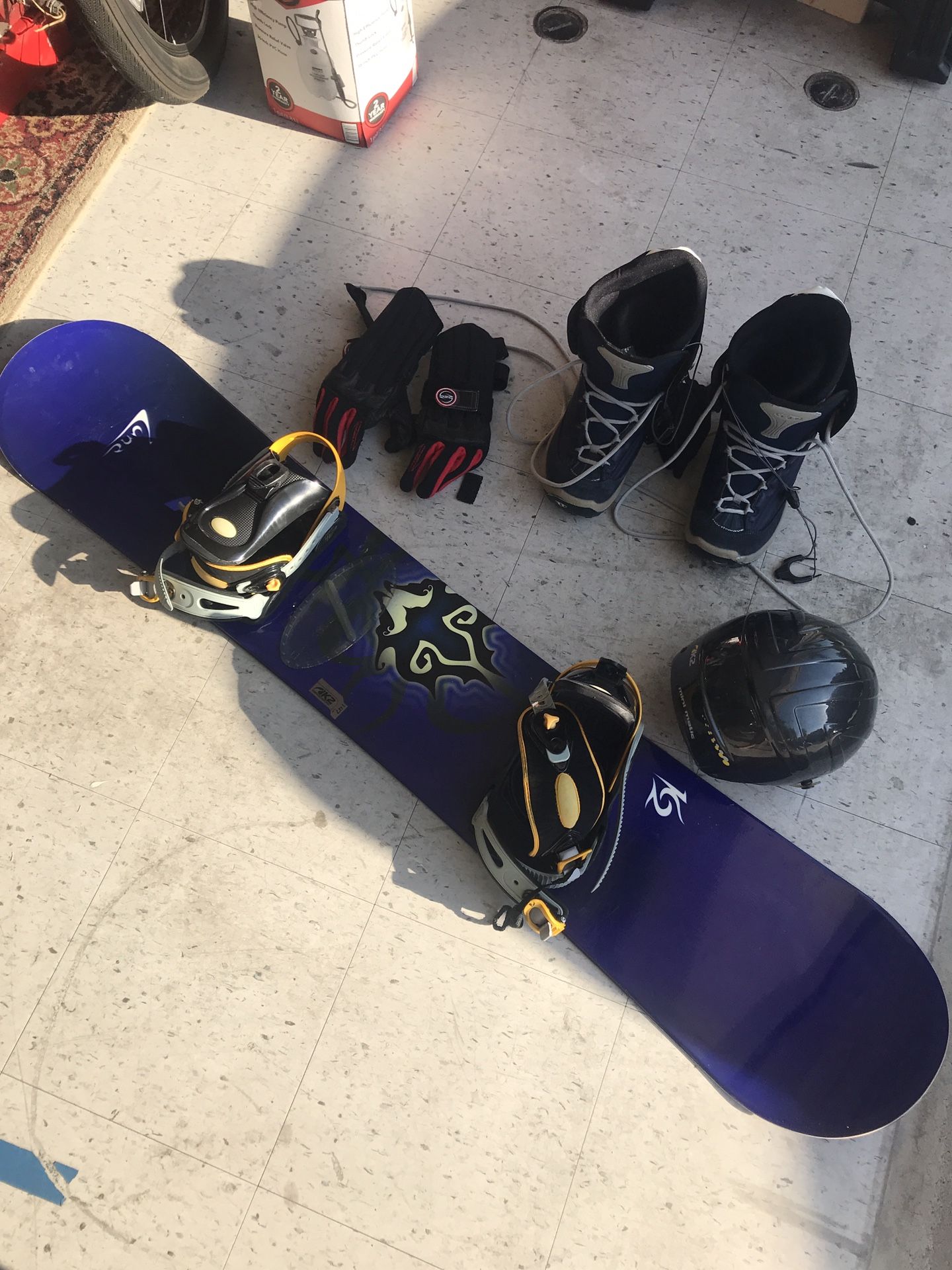 K2 snowboard, boots gloves and helmet with bag, good condition, gently used
