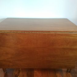 Solid Wood -- Three Part Banquet / Dining Room Table with a pair of Demi Lune by: Tomlinson Fine Furniture.