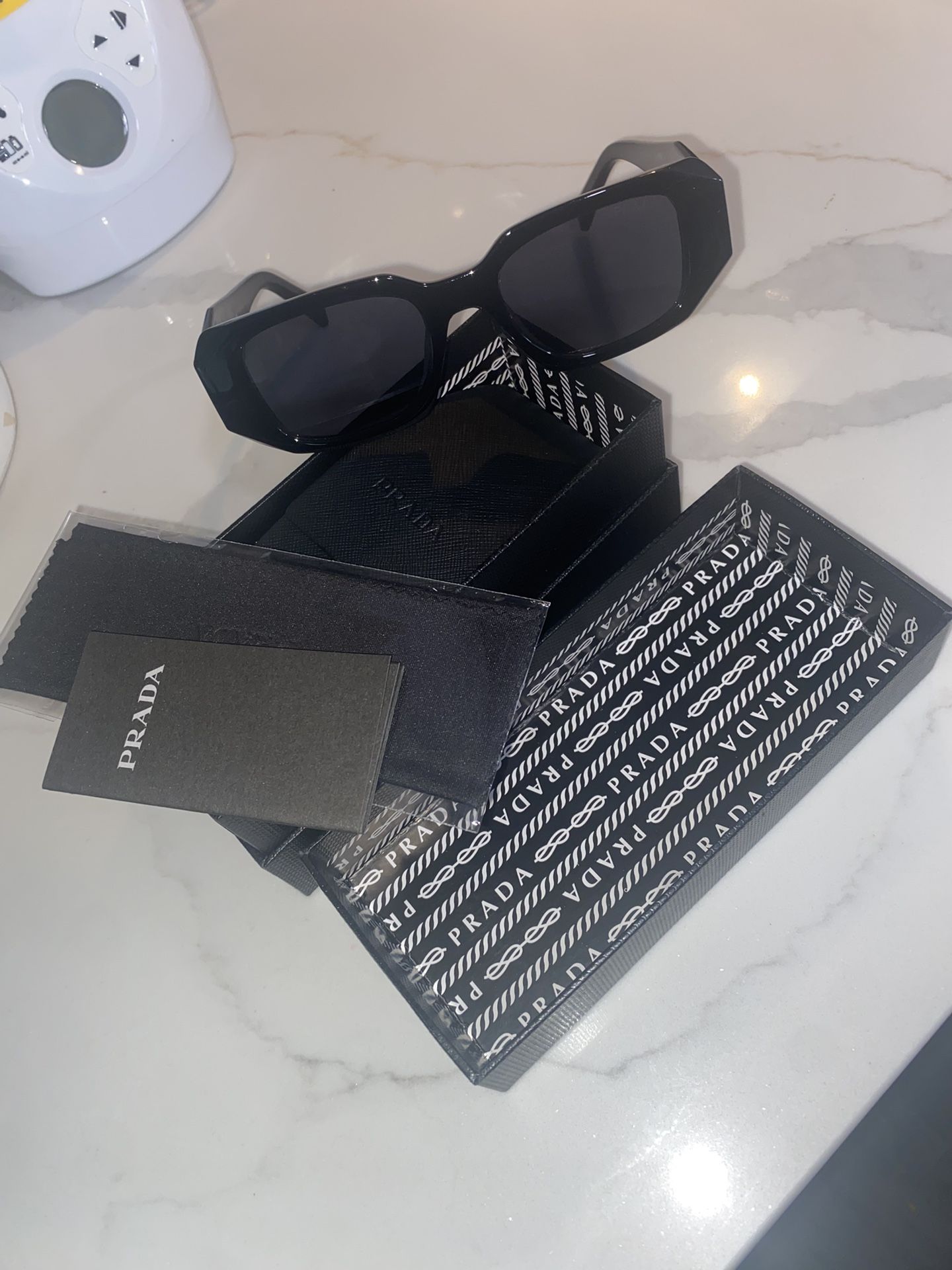 PRADA SUNGLASSES