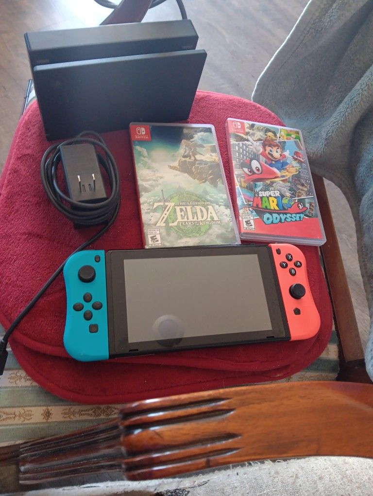 Nintendo Switch And TV Docking Box And 2 Games
