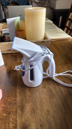 Hand held steamer