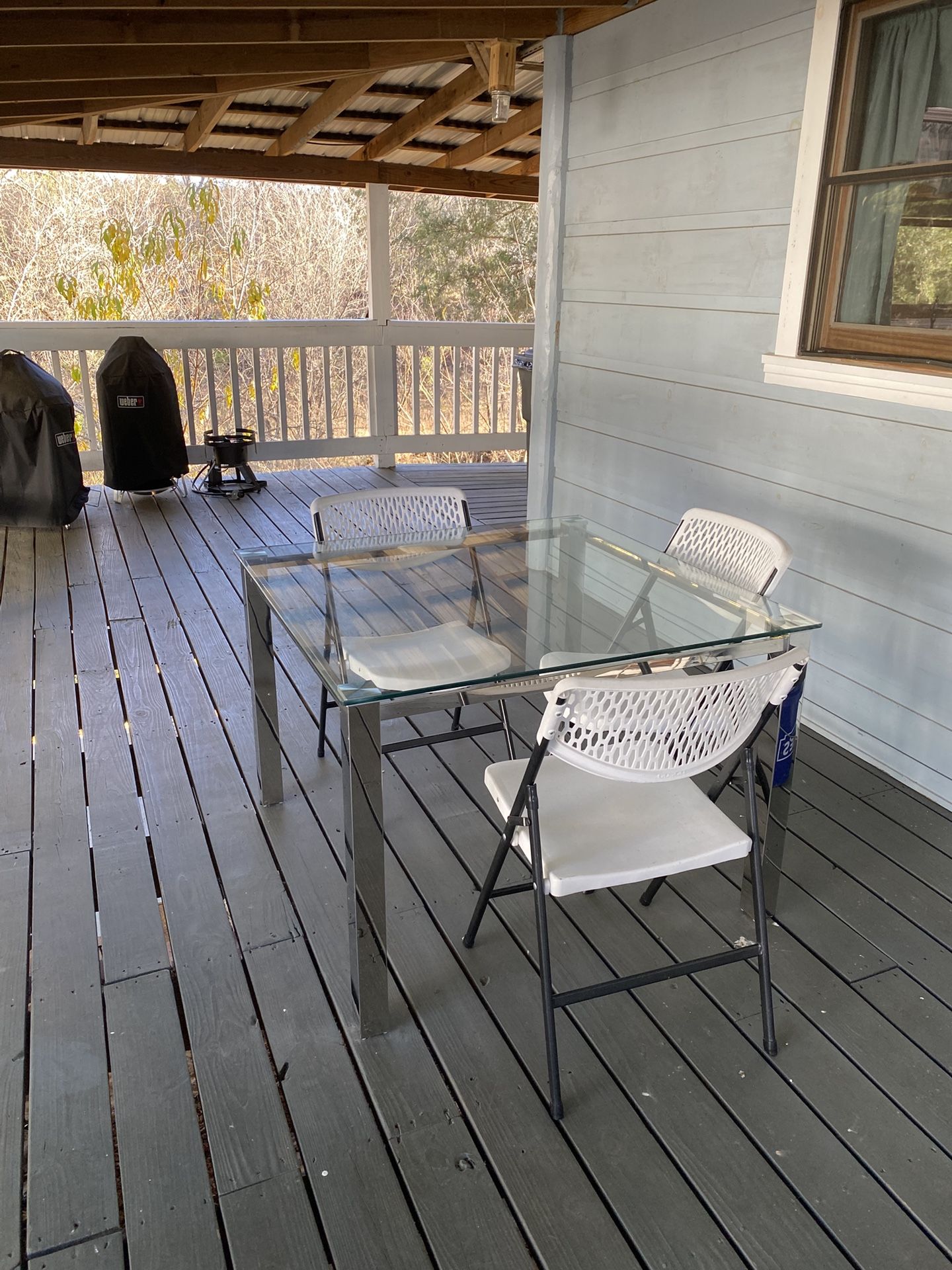 Glass Table With 4 Leather Chairs