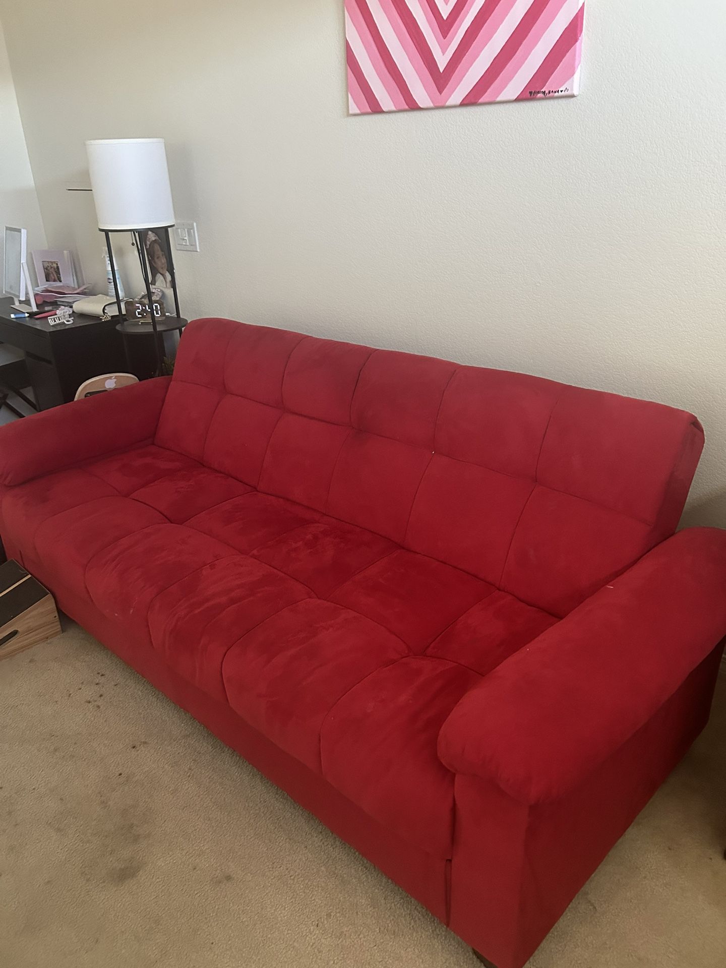 RED FUTON COUCH
