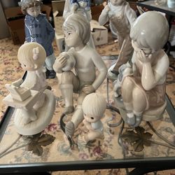 7 Collectible Figurine NAO And Precious  Moment 