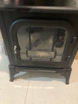 Black Cast Iron Stove (NEED OUT ASAP)