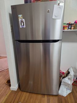 Like new LG stainless steel refrigerator