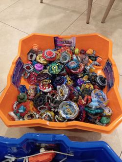 Beyblades 60+ pcs + 3 stadiums + launchers