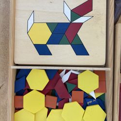 Wooden  toys, wooden puzzles, learning games.  