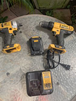 Dewalt Set Of Drills With Buttery And Charger