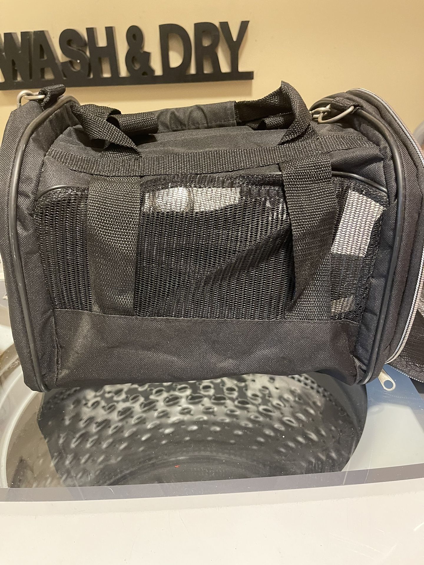 Small pet carrying bag with handle and shoulder straps