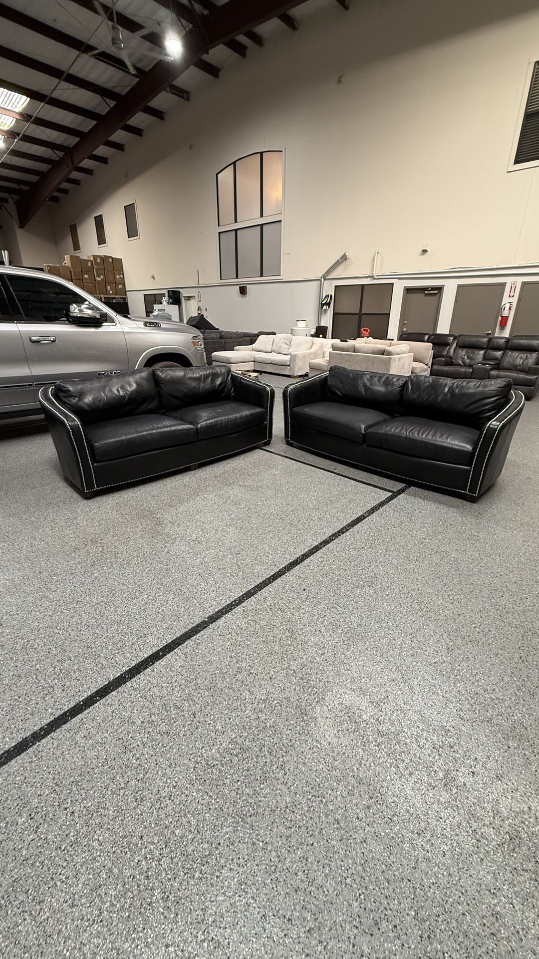 Broyhill Curved Black Leather Sofa