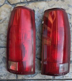 1999 GMC TAIL LIGHTS WITH OFF ROAD COVERS
