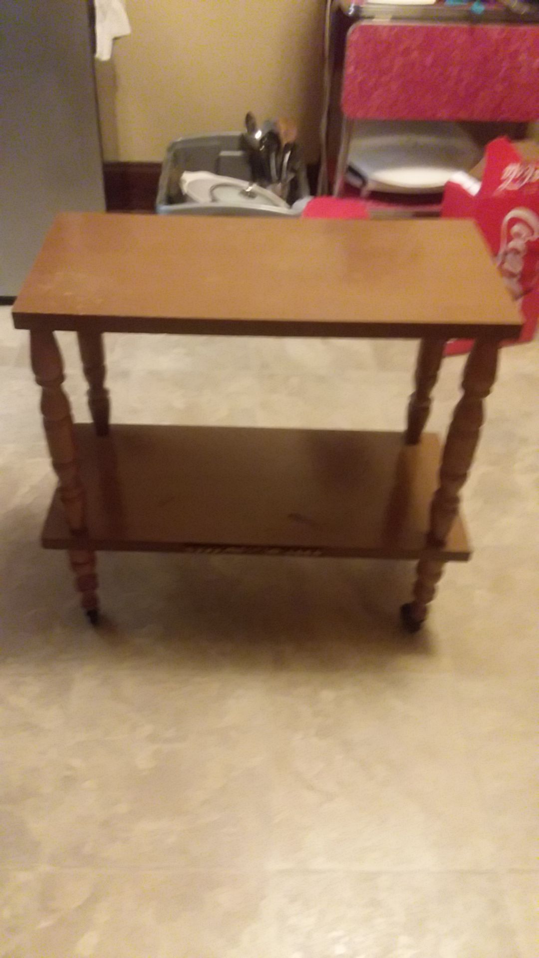 Vintage end table with wheels