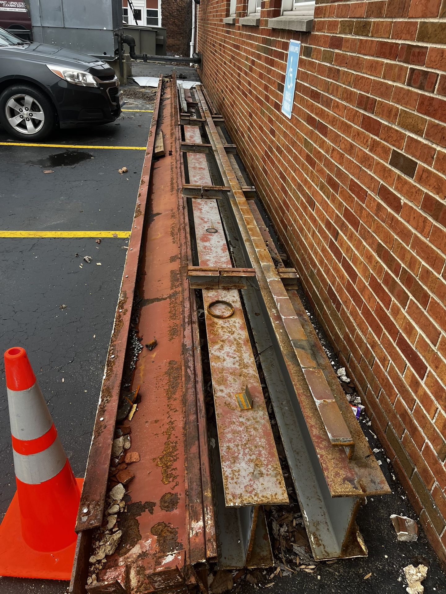 Scrap metal, beams, and metal roof bridge suppoer