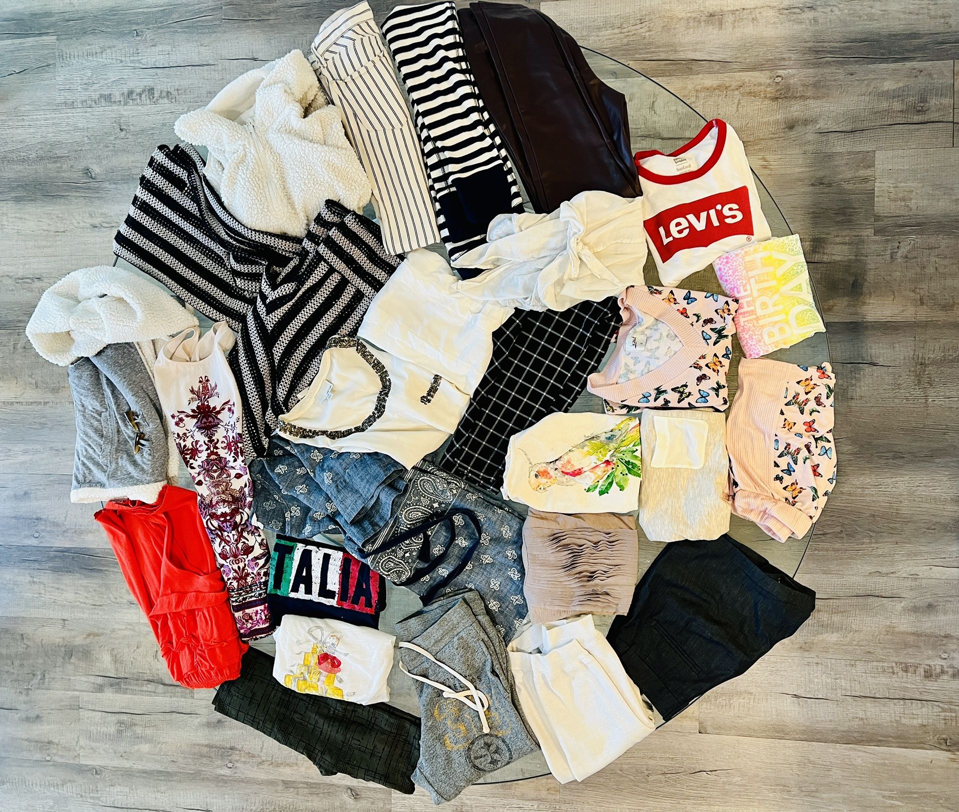 25 piece women’s clothing bundle, Sizes XS and S. Price is total.